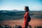 Young woman enjoy unique volcanic landscapes in Canary island