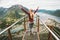 Young woman enjoying aerial mountains view