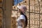 Young woman enjoying the castle of Beni Mellal, also known as the Kasbah of Beni Mellal which is a fortress of Berber origin