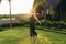 Young woman enjoying freedom in garden