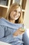 Young Woman Enjoying Glass Of Wine