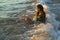 Young Woman Enjoying Ocean Waves
