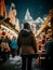Young woman Enjoying of a traditional Christmas Market and a charming winter holidays