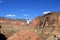 Young woman enjoying view of Grand Canyon from Thunder River Trail.