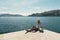 Young woman enjoys vacation. Baska harbour, Krk island. Beautiful view of islands. Summer vacations. Beautiful girl resting on bea