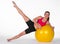 Young woman exercise on pilates ball