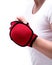 Young woman exercising with one lb weighted glove