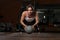 Young Woman Exercising Push Ups On Medicine Ball