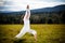 Young woman exercising yoga outdoor