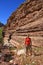 Young woman explores Hance Creek in the Grand Canyon.