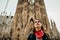 Young woman exploring center of Barcelona,Catalonia,Spain.Emotional spanish woman walking.Visiting famous landmarks and