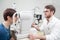 Young woman is during an eye exam with the ophthalmologist