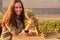 Young woman feeding Indian palm squirrels at Agra Fort, Uttar Pr