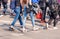 Young woman feet, crossing an urban street