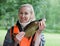 The young woman the fisherman with caught the bream