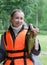 The young woman the fisherman with caught the bream