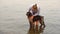 Young woman and German Shorthaired Pointer.