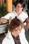 Young woman gets a hairdo in the beauty-shop