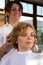 Young woman gets a hairdo in the beauty-shop