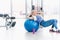 Young woman girl exercise workout in the gym using ball