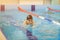 Young woman in goggles and cap swimming breaststroke stroke style in the blue water indoor race pool.