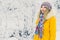 Young Woman happy smiling wearing hat and scarf walking outdoor