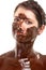 Young woman having a chocolate face mask