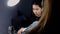 Young woman having a manicure treatment in the salon