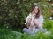 Young woman with her cute Jack Russell Terrier outdoor