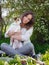 Young woman with her cute Jack Russell Terrier outdoor