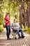 Young woman with her disabled father in wheelchair enjoying time