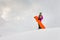 Young woman and her orange snowboard