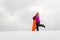 Young woman and her orange snowboard