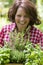 Young woman with herbs