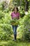 Young woman with herbs in a