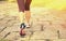 Young woman hiker feet walking rural trail