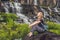 Young woman hiker, tourist on the background of Amazing Pongour