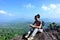 Young woman hiker using smartphone