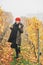 Young woman hiking in Lavaux vineyards in autumn