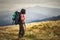 Young woman hiking on mountains with backpack Travel Lifestyle a