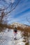 Young woman hiking Rtanj mountain in winter, Serbian Carpathians