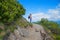 Young woman at hiking trail herzogstand mountain, bavarian alps