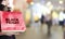 Young woman holding black friday shopping bag