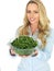 Young Woman Holding a Bowl of Freshly Cooked Green Beans