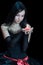 Young woman holding candle