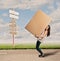 Young woman holding a cardbox