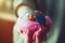 Young woman holding earth globe wrapped in plastic bag