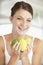 Young Woman Holding Fresh Fruit