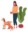 Young woman holding hamster in hands, orange cat and dog standing near woman, love animals