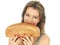 Young Woman Holding a Loaf of Brown Bread